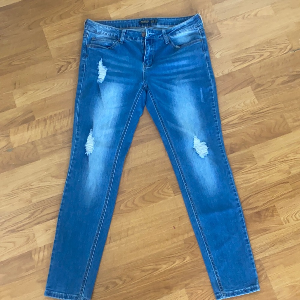 Gently used light wash ripped jean